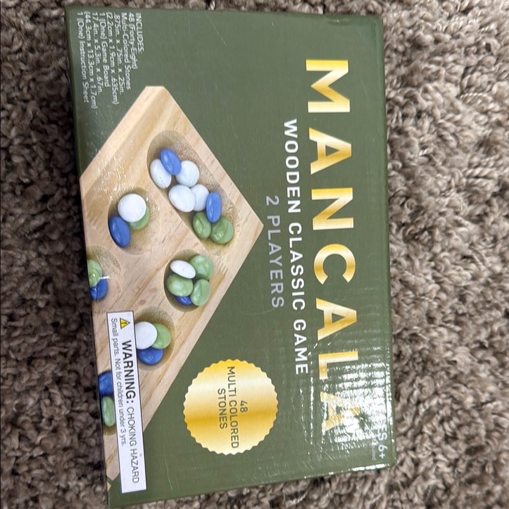 Elegant Green Board Game Collection with Gold Accents